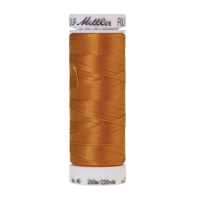 Amann Mettler Poly Sheen Ashley Gold glänzt durch den trilobalen Fadenquerschnitt besonders schön. Zum Sticken, Quilten, Nähen. 200m Spule