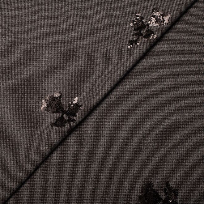 Paillettenstickerei auf graukariertem Grund (made in Italy)