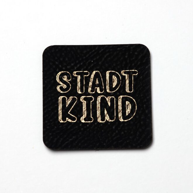 Kunstlederlabel Stadtkind (schwarz/gold)